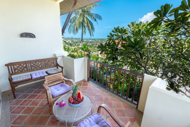 Balcony seating with a garden view