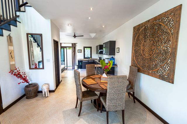 Dining room with carved wall panel