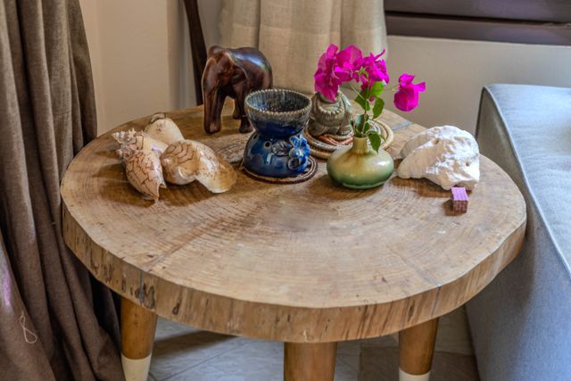 Teak table with flowers